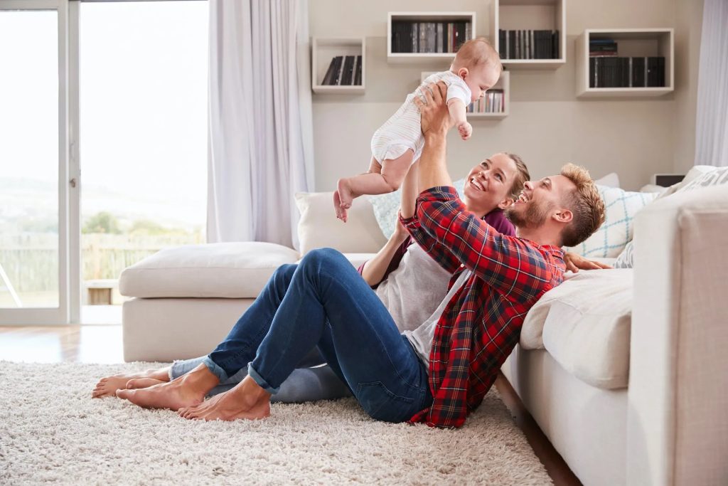 A happy family after a successful mold inspection in Phoenix has cleared their home of mold